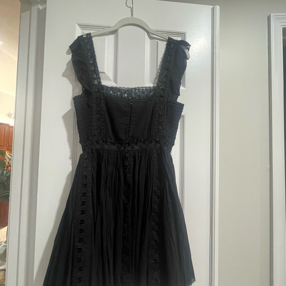 Chic Black Ruffled Mini Dress - Picture 3 of 6